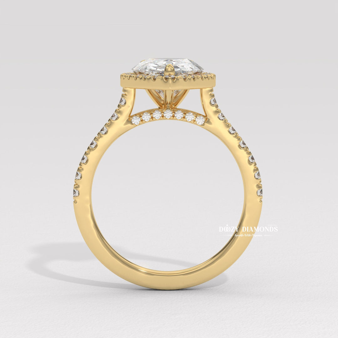 Pear shaped diamond ring
Pear cut diamond ring
Halo diamond ring
Tear drop engagement ring