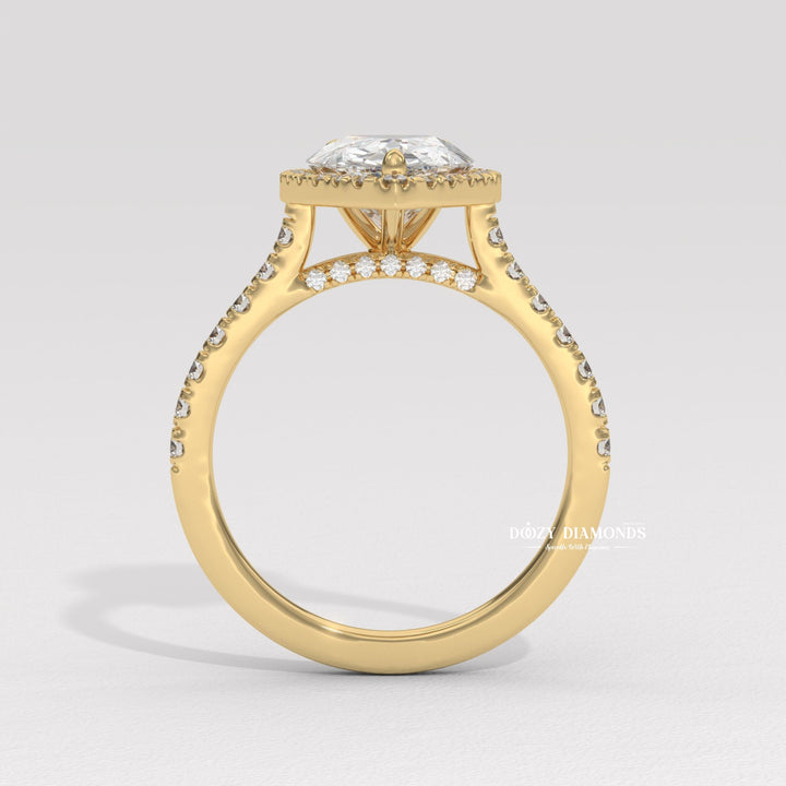 Pear shaped diamond ring
Pear cut diamond ring
Halo diamond ring
Tear drop engagement ring