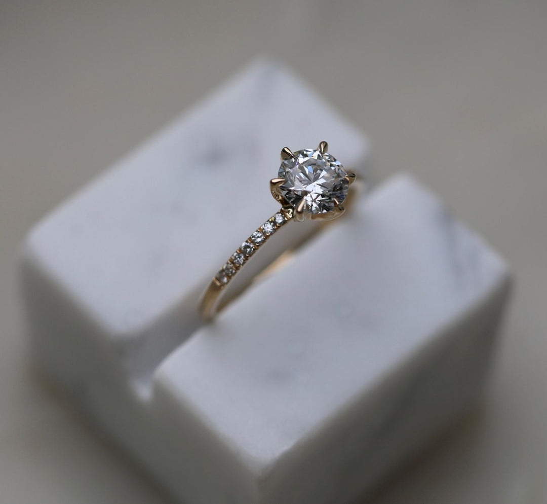 round solitaire engagement ring