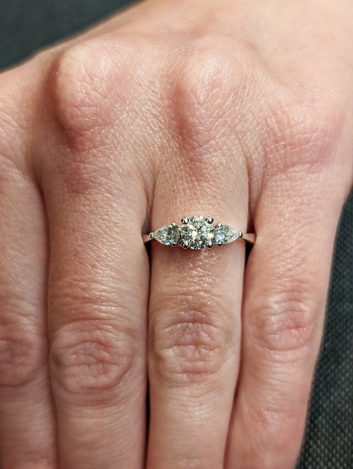 round cut side stone ring