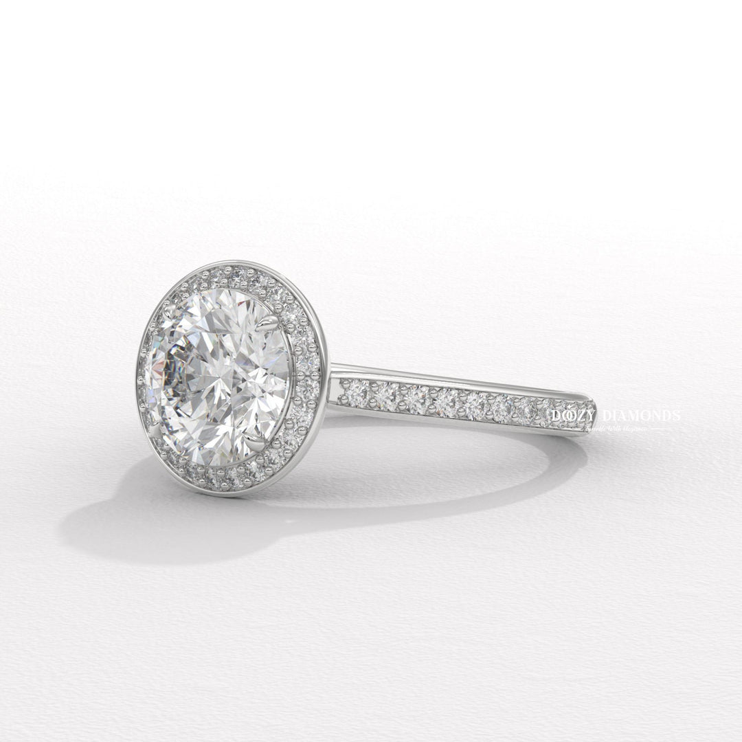 designer bridal jewelry, statement bridal ring, glamorous halo ring, round halo engagement ring for women, luxury proposal jewelry, wedding jewelry for women, modern bridal ring,