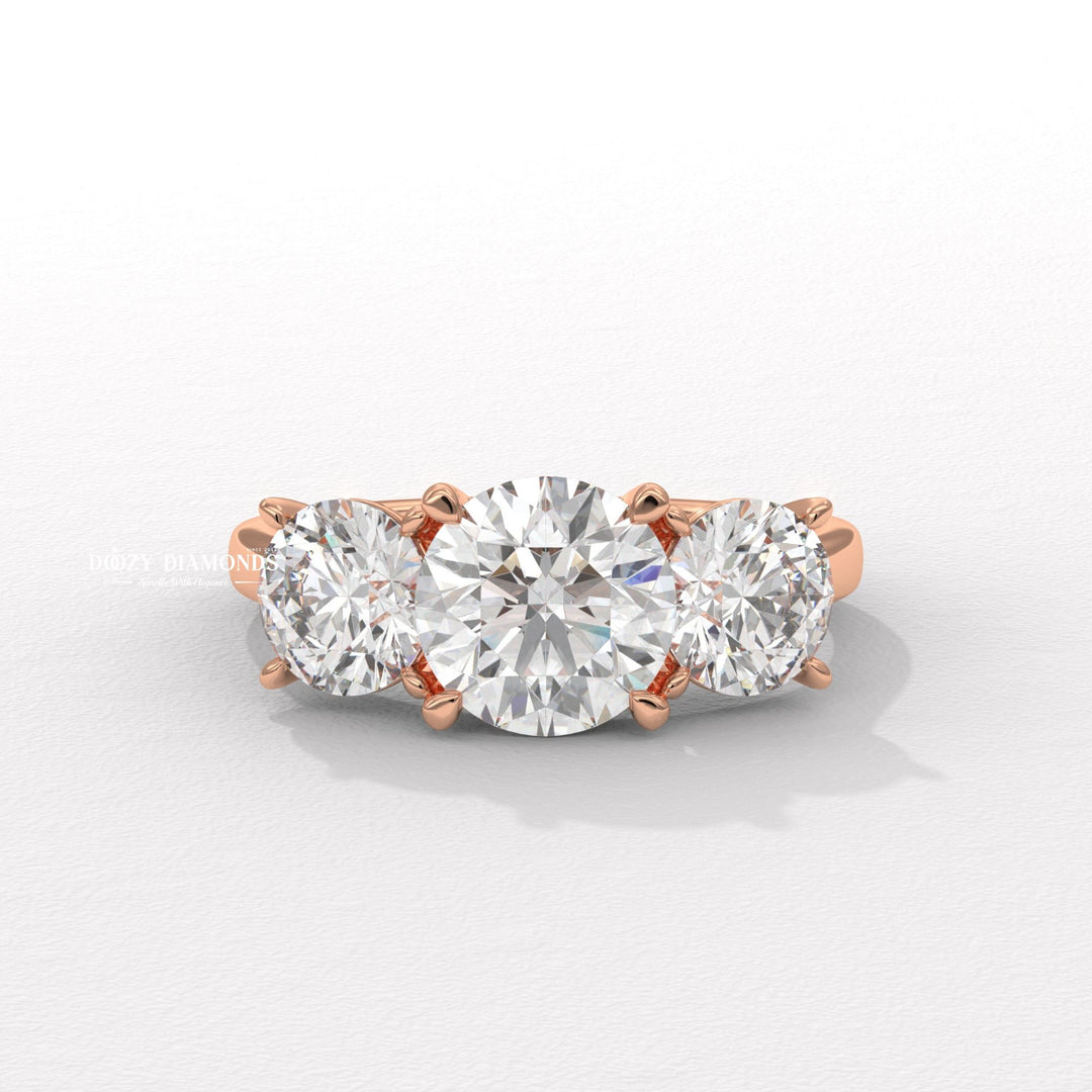 Round diamond with round side stones
Unique charm engagement ring
Three stone round diamond ring
