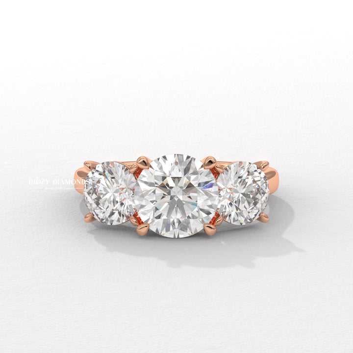Round diamond with round side stones
Unique charm engagement ring
Three stone round diamond ring
