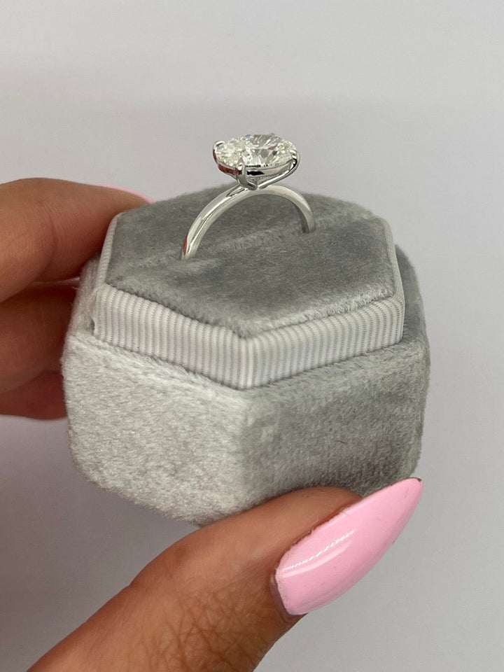 sparkling oval solitaire diamond ring,