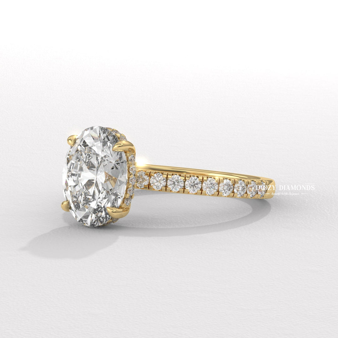 sophisticated diamond ring, luxury ring for women, wedding proposal ring, premium bridal jewelry, timeless bridal jewelry, elegant bridal jewelry, oval halo ring, oval pave ring, oval cathedral ring,