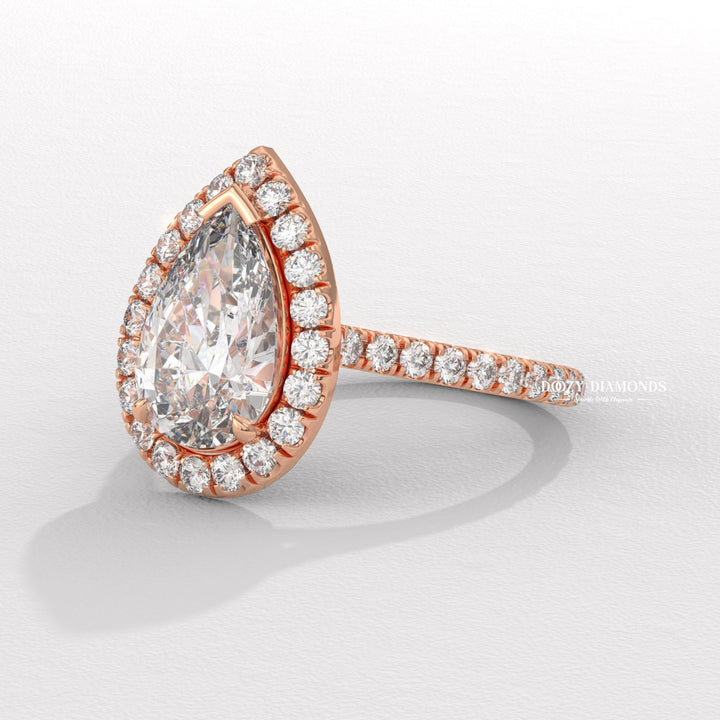 pear lab diamond ring, pear diamond bridal ring, F color diamond ring, VS clarity diamond ring, luxury halo diamond ring, diamond proposal ring, sustainable bridal ring, ethical lab diamond ring,