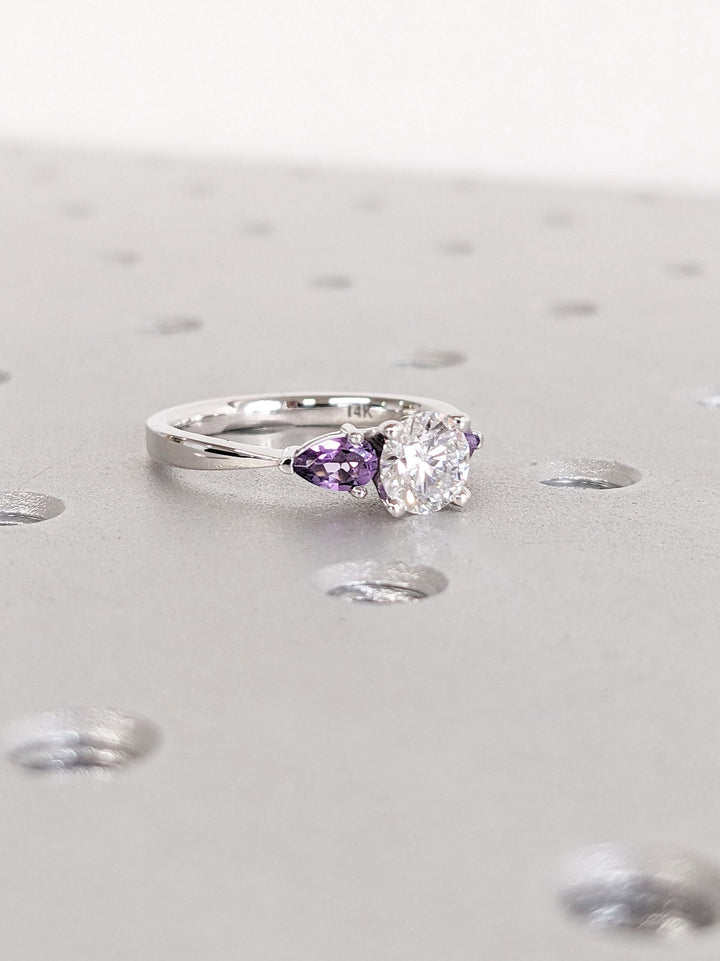 emerald cut engagement ring with accent diamonds