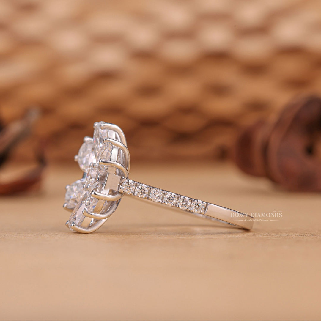 sophisticated engagement ring, statement engagement ring, floral bridal ring, sparkling diamond ring, proposal ring for her, engagement ring inspiration, refined diamond ring, polished diamond jewelry,