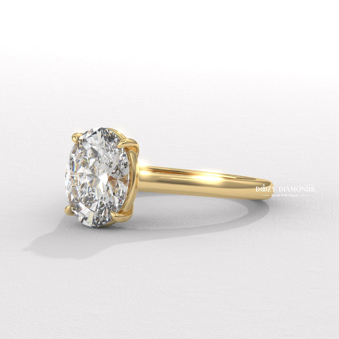 modern engagement ring, romantic proposal ring, oval solitaire ring, oval center stone ring, oval shape diamond ring, elongated oval diamond ring, oval brilliant diamond ring, engagement jewelry,