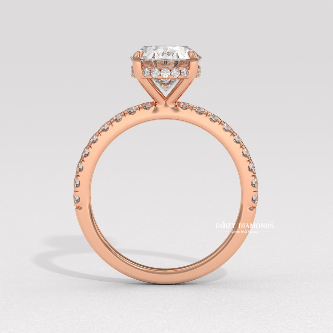 oval shape diamond ring, elongated diamond ring, engagement jewelry, bridal accessories, luxury bridal ring, handcrafted engagement ring, fine diamond jewelry, sparkling diamond ring,