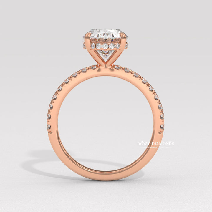 oval shape diamond ring, elongated diamond ring, engagement jewelry, bridal accessories, luxury bridal ring, handcrafted engagement ring, fine diamond jewelry, sparkling diamond ring,