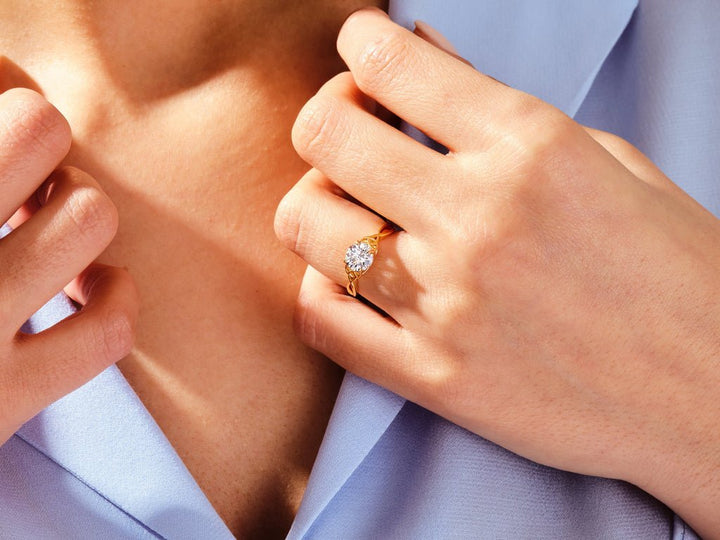 Round art deco engagement ring close-up highlighting diamond sparkle