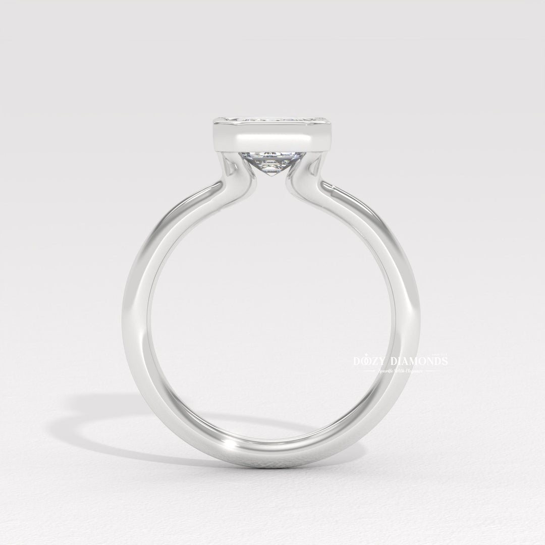 fine diamond jewelry, emerald center stone ring, minimalist engagement ring, contemporary bridal jewelry, artisan crafted ring, luxury statement jewelry, bridal keepsake ring, elegant wedding