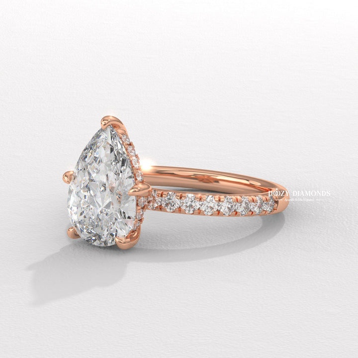 diamond jewelry, statement engagement ring, premium diamond ring, romantic proposal ring, fine diamond jewelry, bridal accessories, wedding proposal ring, forever love ring, pear center stone ring, designer engagement ring, elegant bridal jewelry,