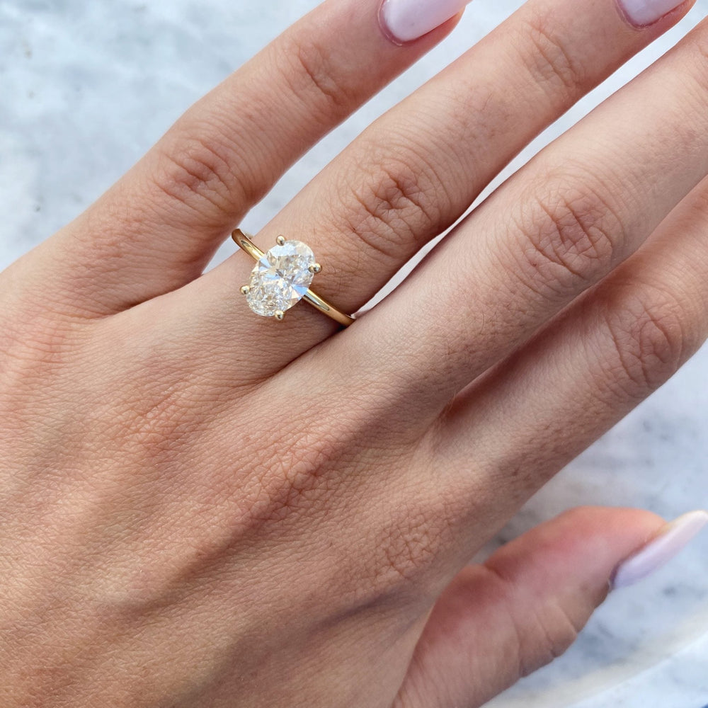 1.5 carat oval engagement ring, oval solitaire diamond ring, G VS2 diamond ring, luxury oval diamond ring, engagement ring for her, bridal jewelry, wedding jewelry, luxury jewelry gift, modern romance ring, artisan engagement ring, handcrafted luxury ring, premium bridal jewelry, luxury romance jewelry, bridal keepsake ring, timeless bridal ring, luxury heirloom ring, exclusive diamond ring, fine luxury jewelry, sustainable bridal jewelry,