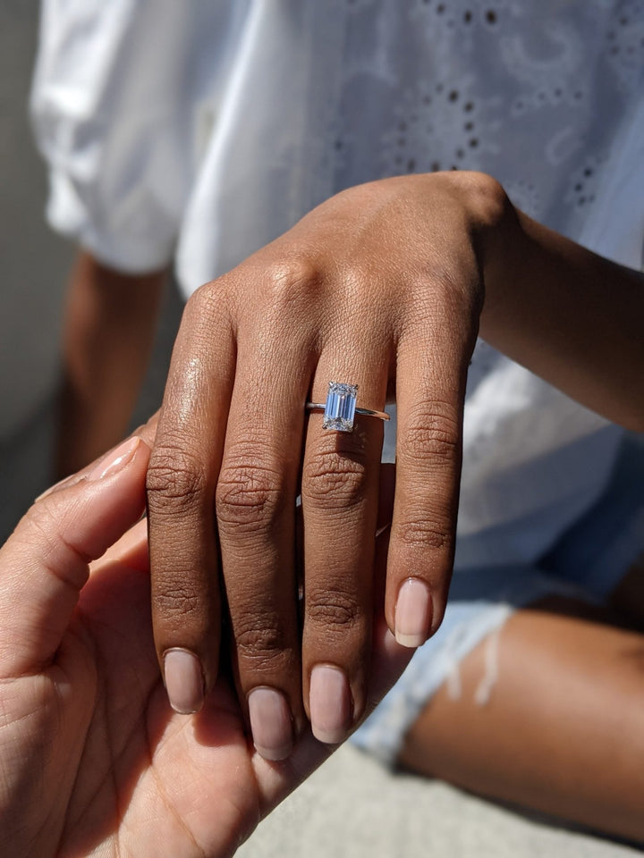solitaire engagement ring, emerald solitaire ring, classic engagement ring, minimalist engagement ring, designer engagement ring, elegant engagement ring, timeless engagement ring,