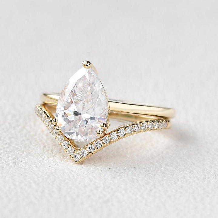 1.95tcw Pear Solitaire Moissanite Engagement Ring with Curved Wedding Band