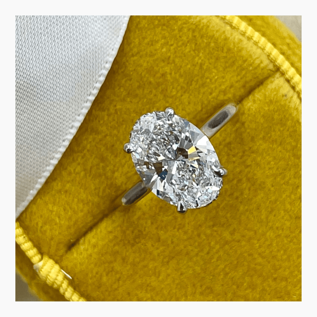 modern hidden halo diamond ring,