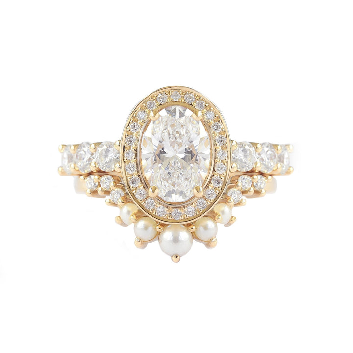 , oval center stone halo engagement ring,