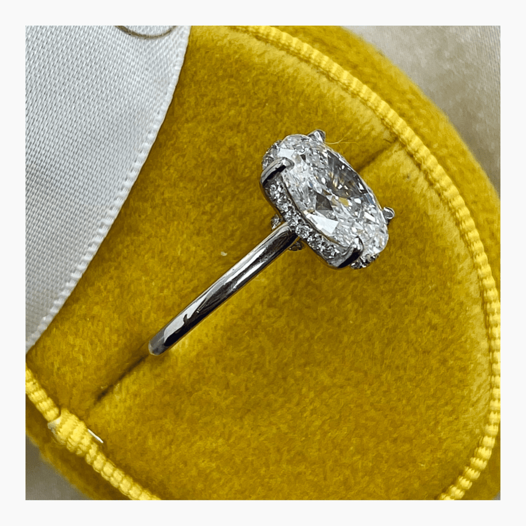 oval center stone hidden halo ring,
