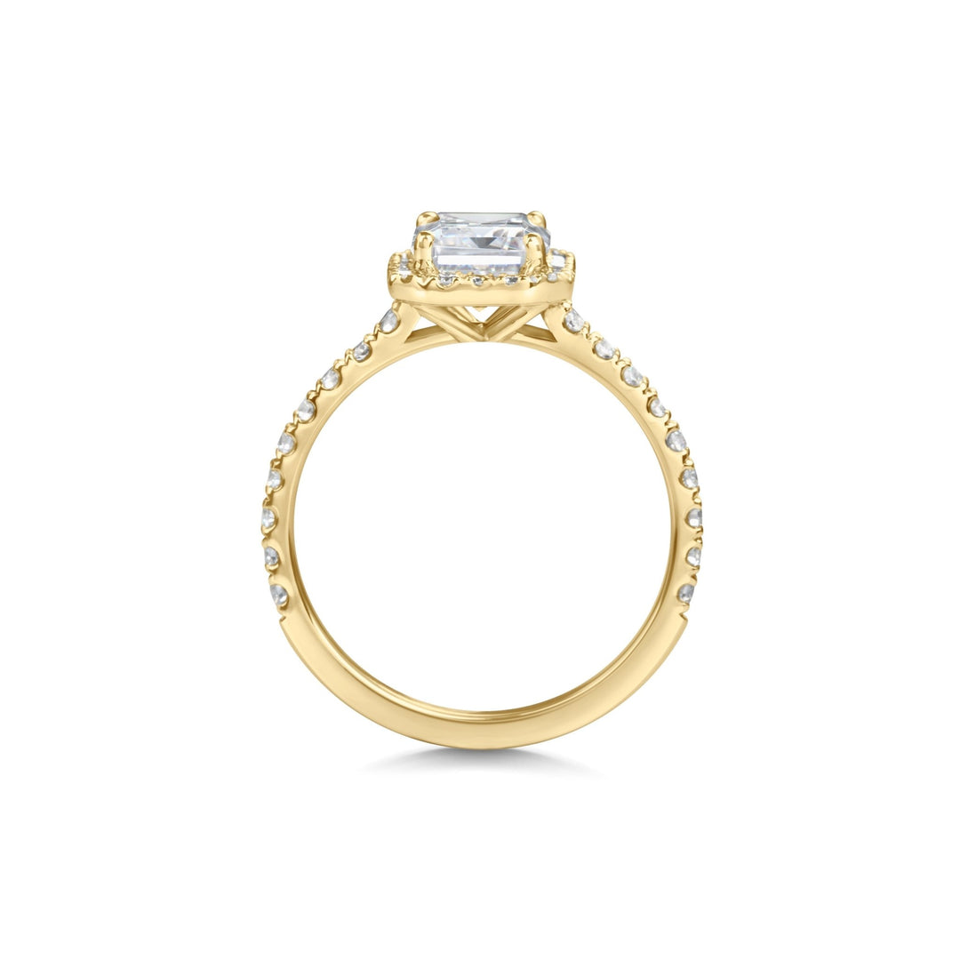 glamorous emerald halo engagement ring
