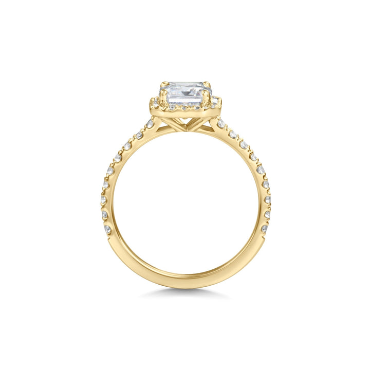 glamorous emerald halo engagement ring