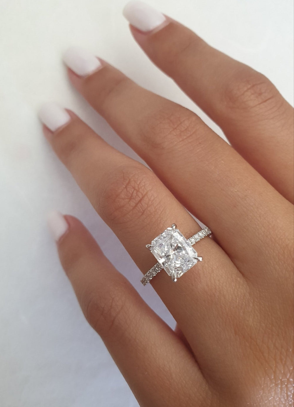 ethical bridal jewelry, eco conscious jewelry, lab grown bridal ring, lab grown wedding ring, radiant lab diamond ring, radiant lab grown diamond ring, hidden halo lab diamond ring,