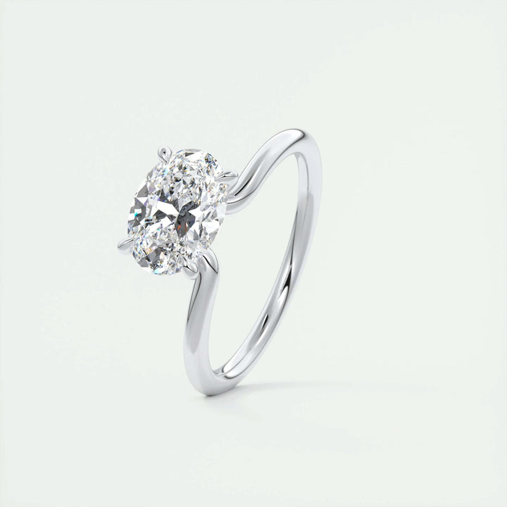 luxury diamond centerpiece ring, premium oval proposal ring, bridal elegance jewelry, oval treasure ring, exclusive solitaire engagement ring, horizontal oval bridal ring, refined oval diamond ring, distinctive oval engagement ring, east west bridal ring, timeless diamond engagement ring,