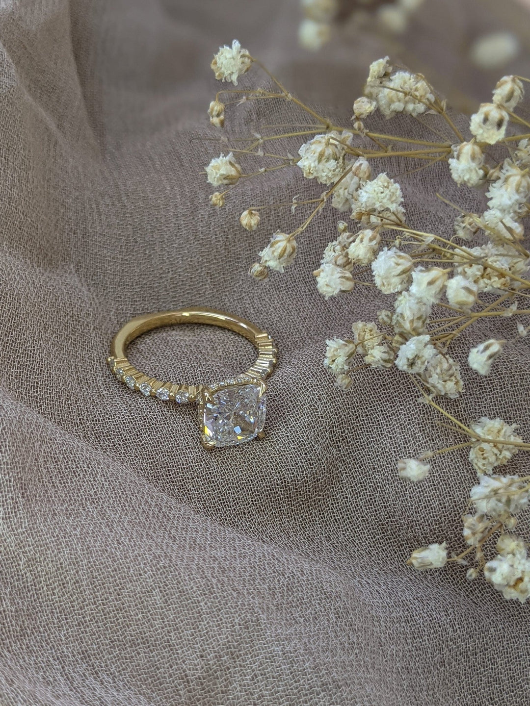 hidden halo engagement ring, hidden halo diamond ring, cushion hidden halo ring, luxury engagement ring, designer engagement ring, elegant engagement ring, timeless engagement ring,