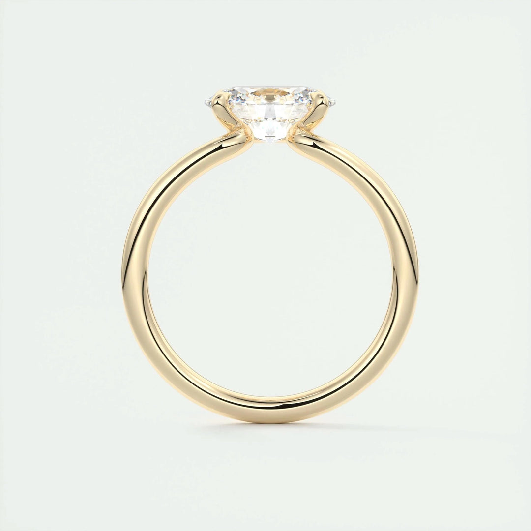 oval diamond anniversary ring, minimalist oval solitaire, iconic oval engagement ring, luxury proposal jewelry, bridal diamond jewelry, oval wedding ring, classic oval diamond ring, premium engagement ring, refined diamond ring, modern luxury ring,