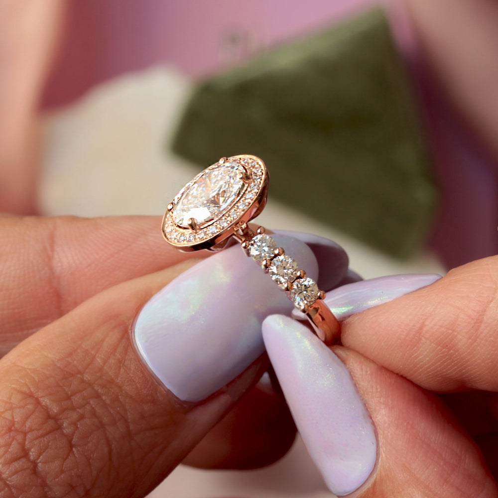 oval cut halo diamond engagement ring