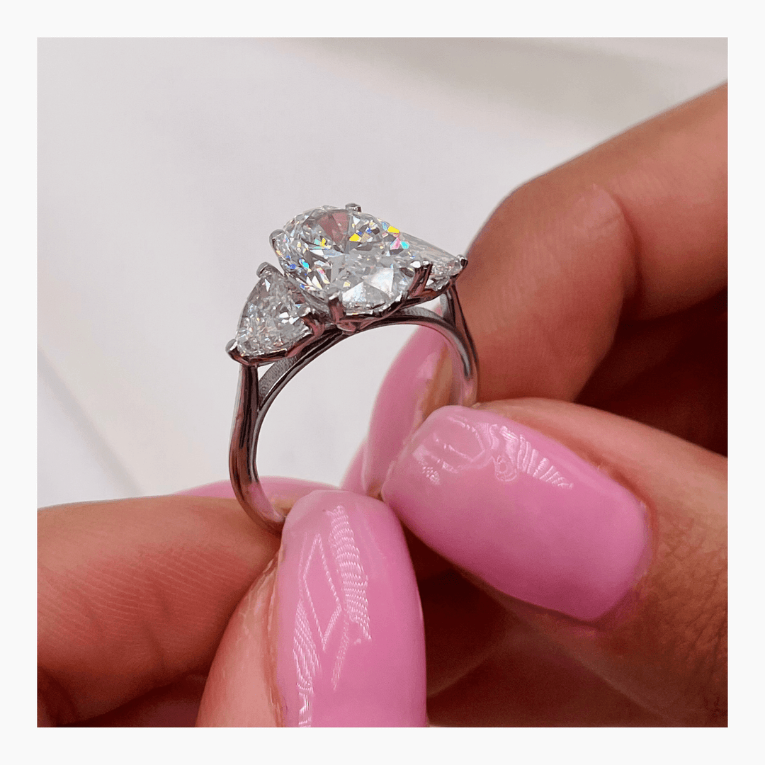 luxury oval three stone engagement ring